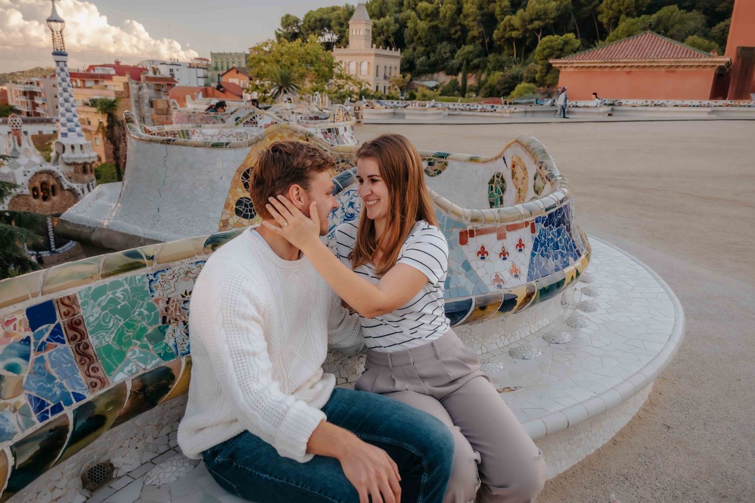 Candid Barcelona photographer capturing a private proposal in a busy park.