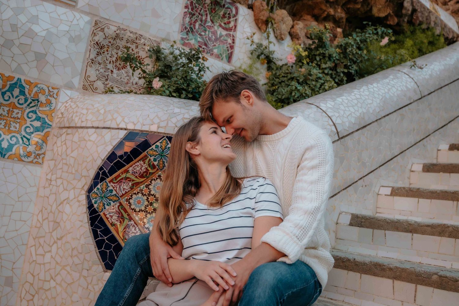 Ben speaking to Megan in a quiet corner of Park Güell before proposing.