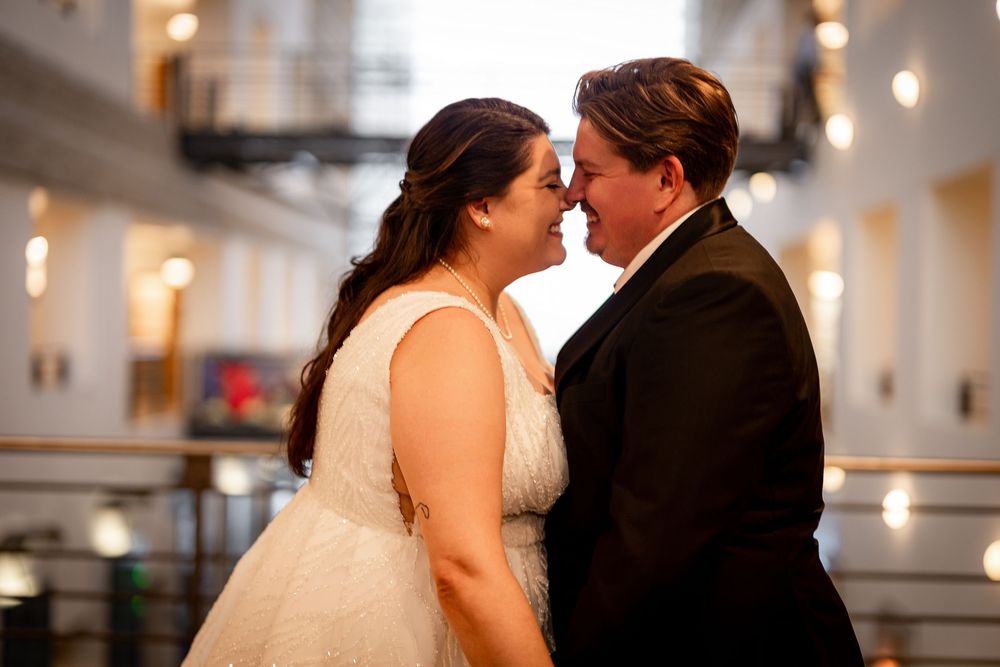 A romantic wedding dance sequence captured in warm lighting indoors.