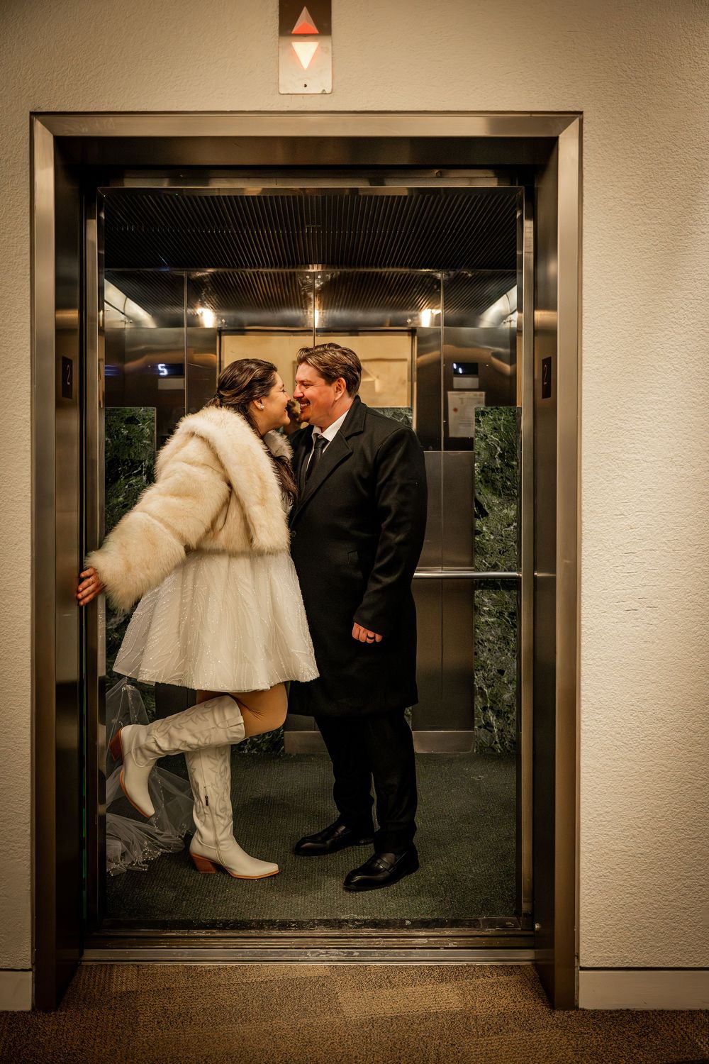 A romantic wedding couple shares a tender kiss in front of three elevator doors in a sepia-toned photo sequence.