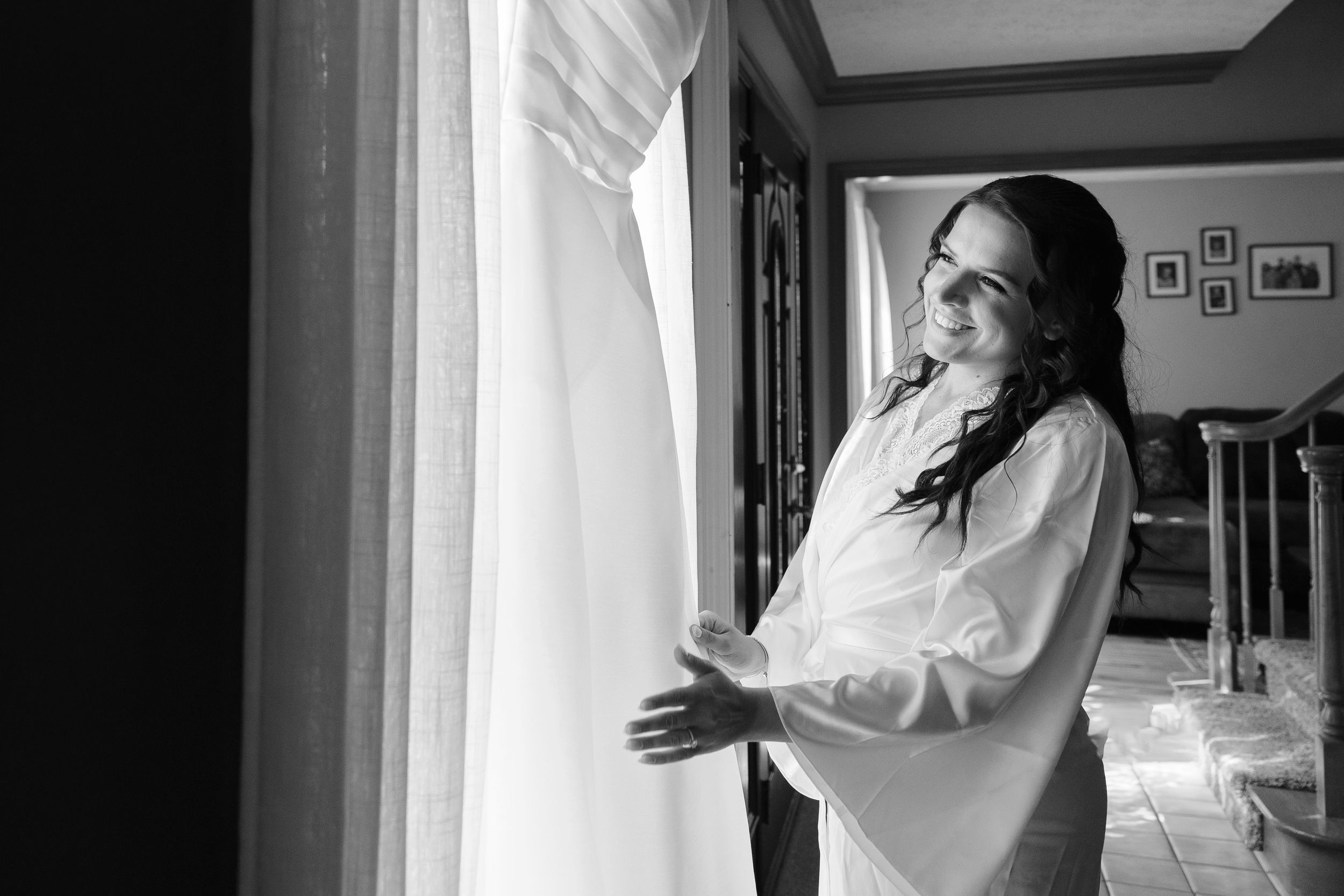 Ohio bride looking at her wedding dress.