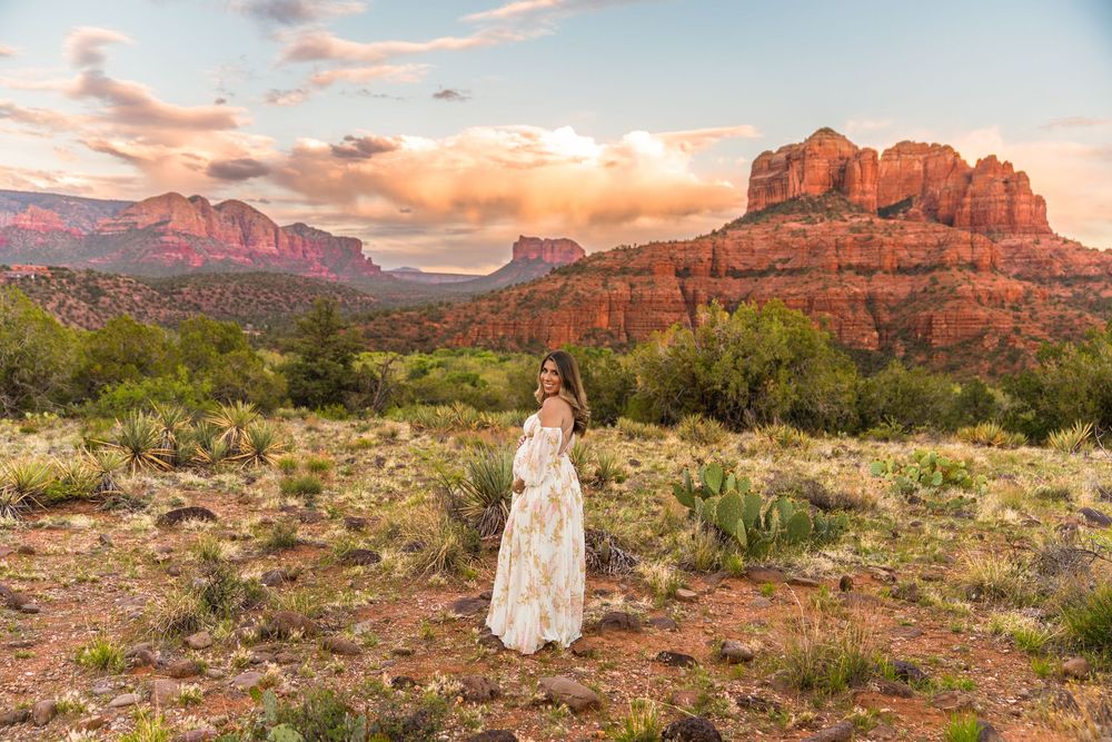 Panoramic view of majestic red rock formations in Sedona during golden hour.