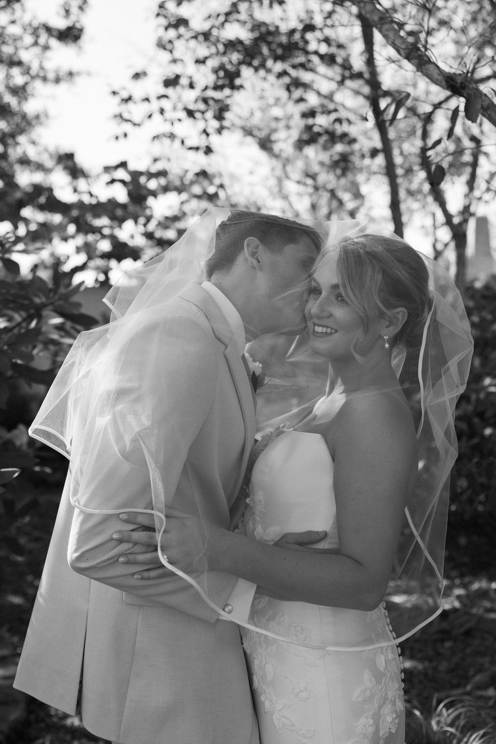 Black and white photograph of bride and groom at Lillian Gardens in Newnan, Georgia