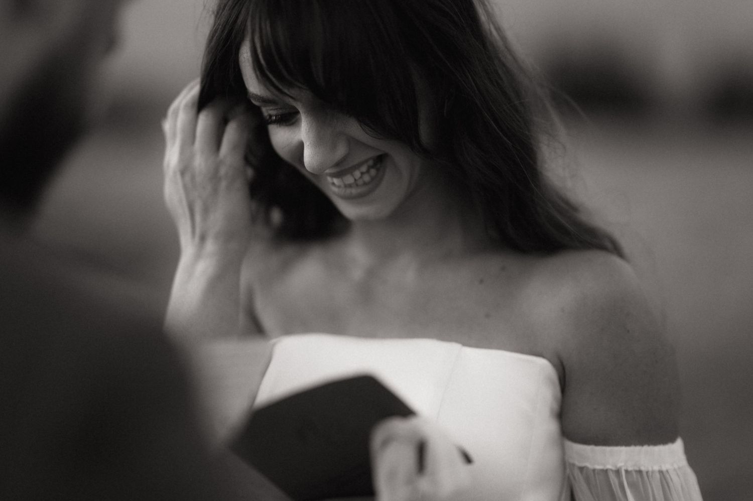 Black and white photo series showing intimate moments between a couple dancing and embracing together.