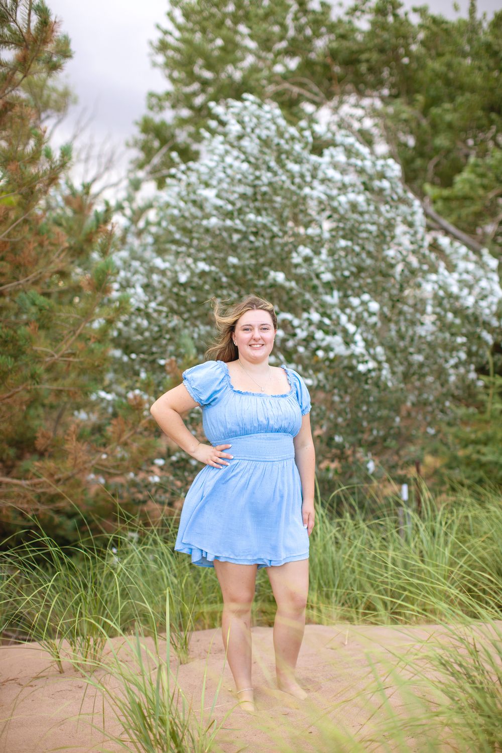 High school senior portrait with Lake Superior at Park Point Beach