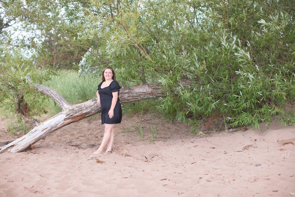 Outdoor senior photography at Park Point Beach in Duluth
