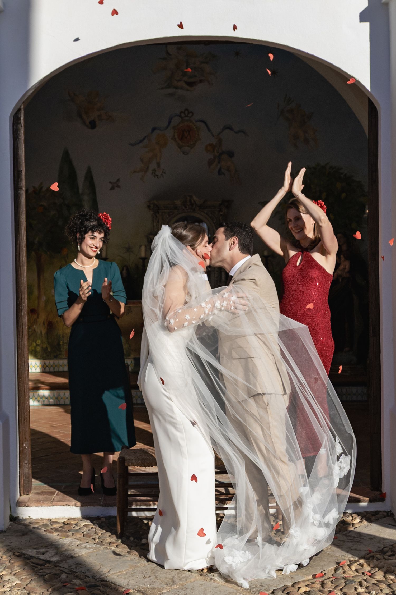 A romantic wedding photo sequence showing tender moments between newlyweds with a flowing veil and white bouquet.