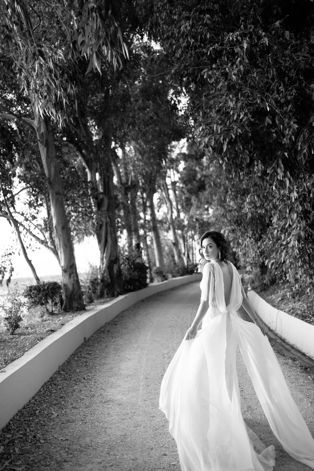 Elegant Italian wedding venue with bride and groom, fine art destination wedding photography