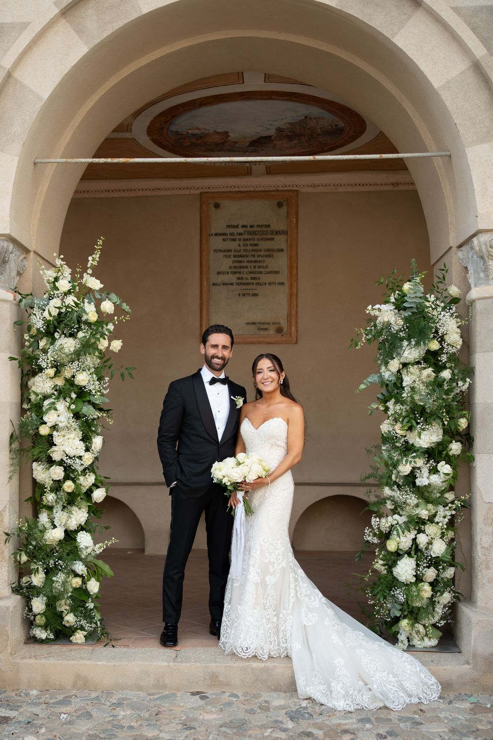 Romantic destination wedding in southern Italy, bride and groom in an olive grove