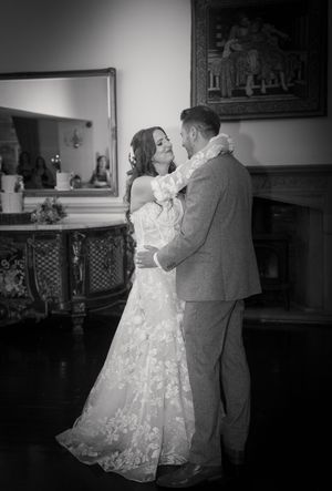 Black and white wedding dance sequence showing couple in intimate slow dance.
