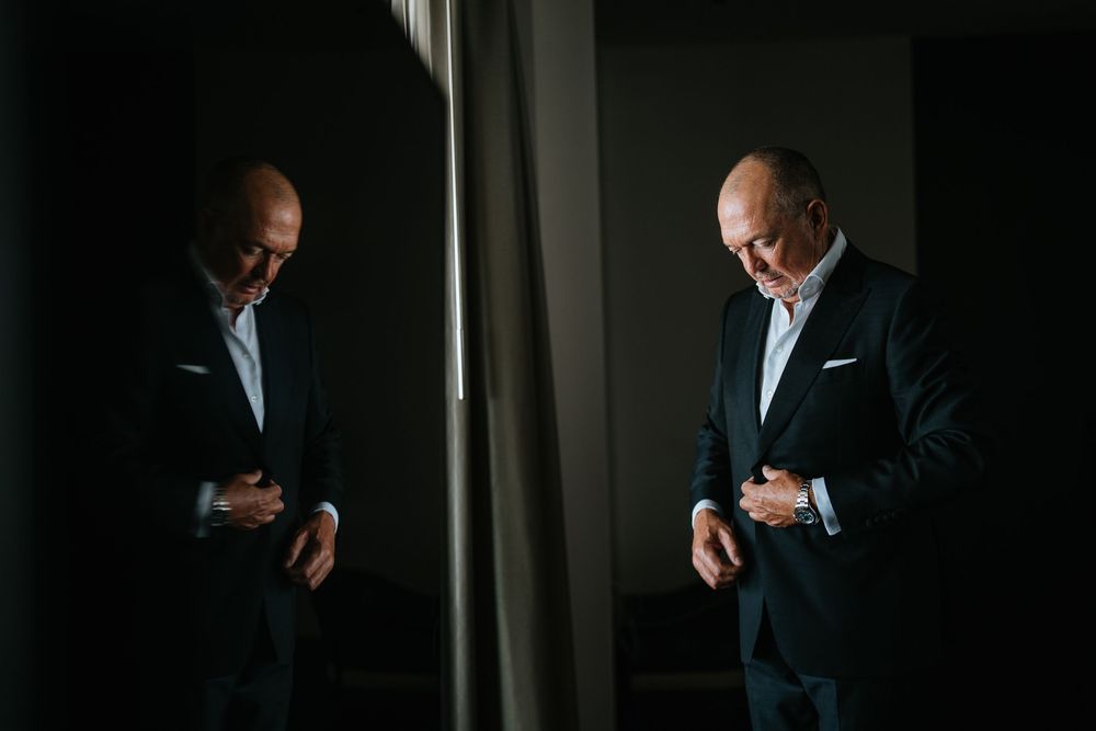Series of dramatic black and white portraits in low-key lighting.