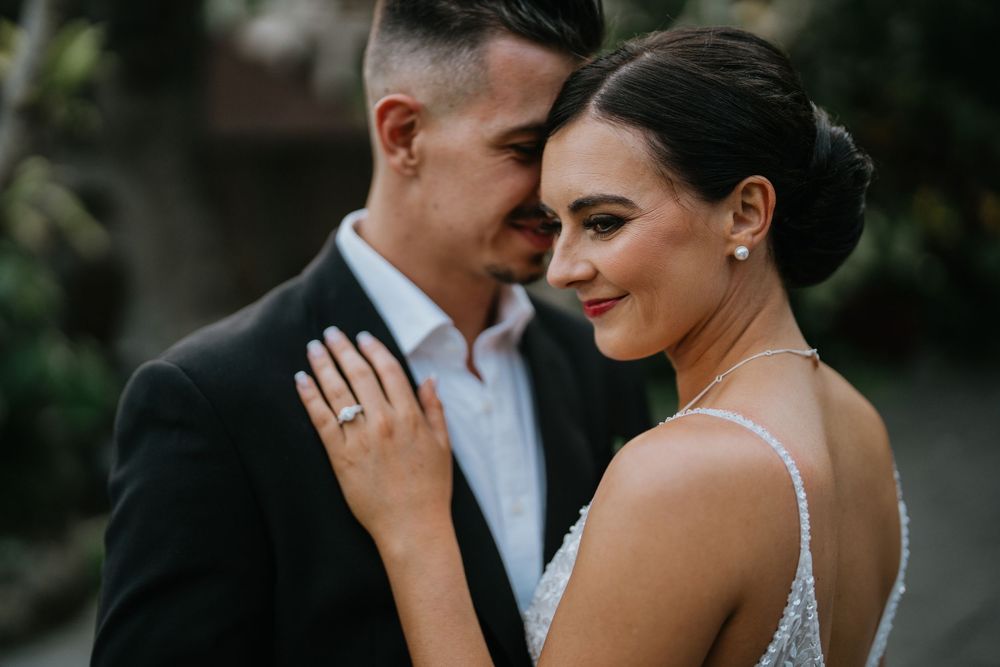 Intimate wedding couple portraits captured during sunset.