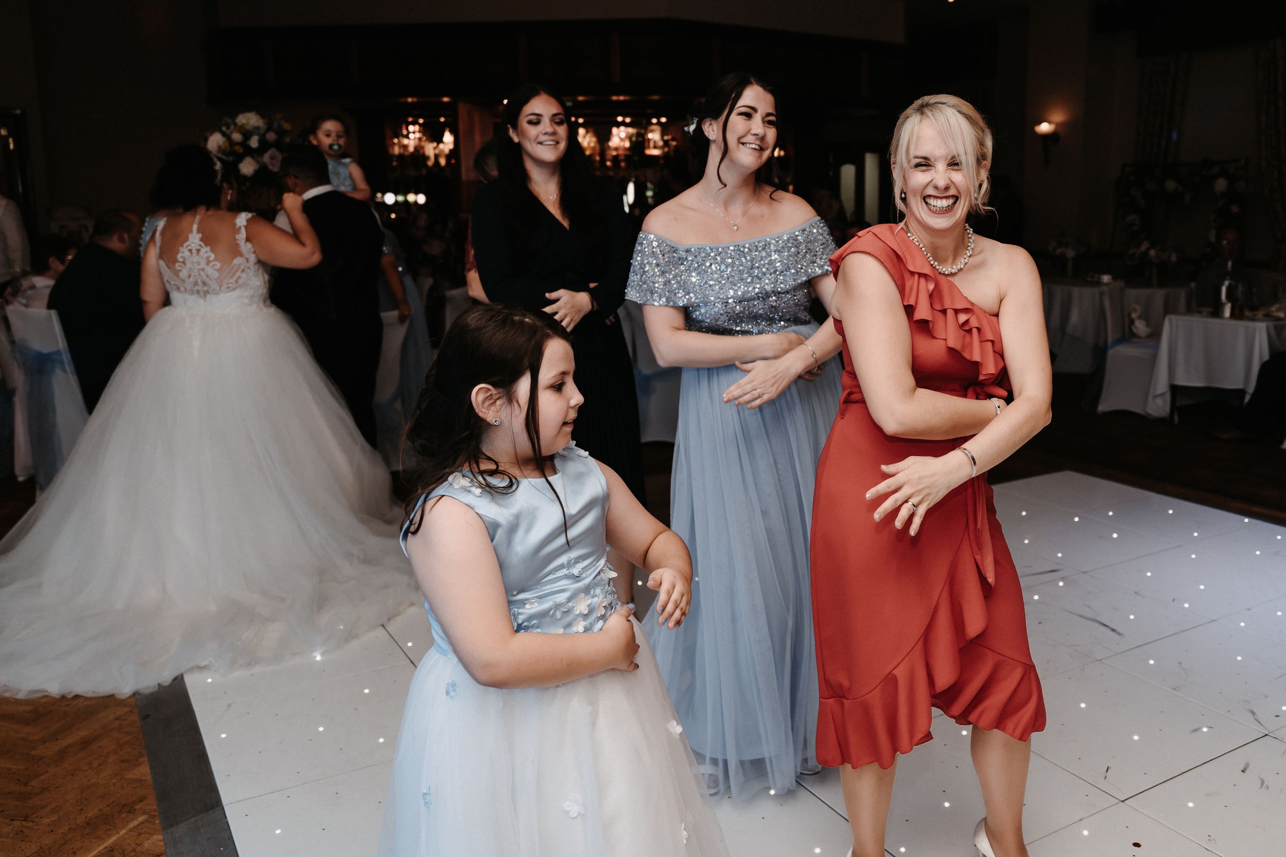 South wales wedding photographer dancing at reception