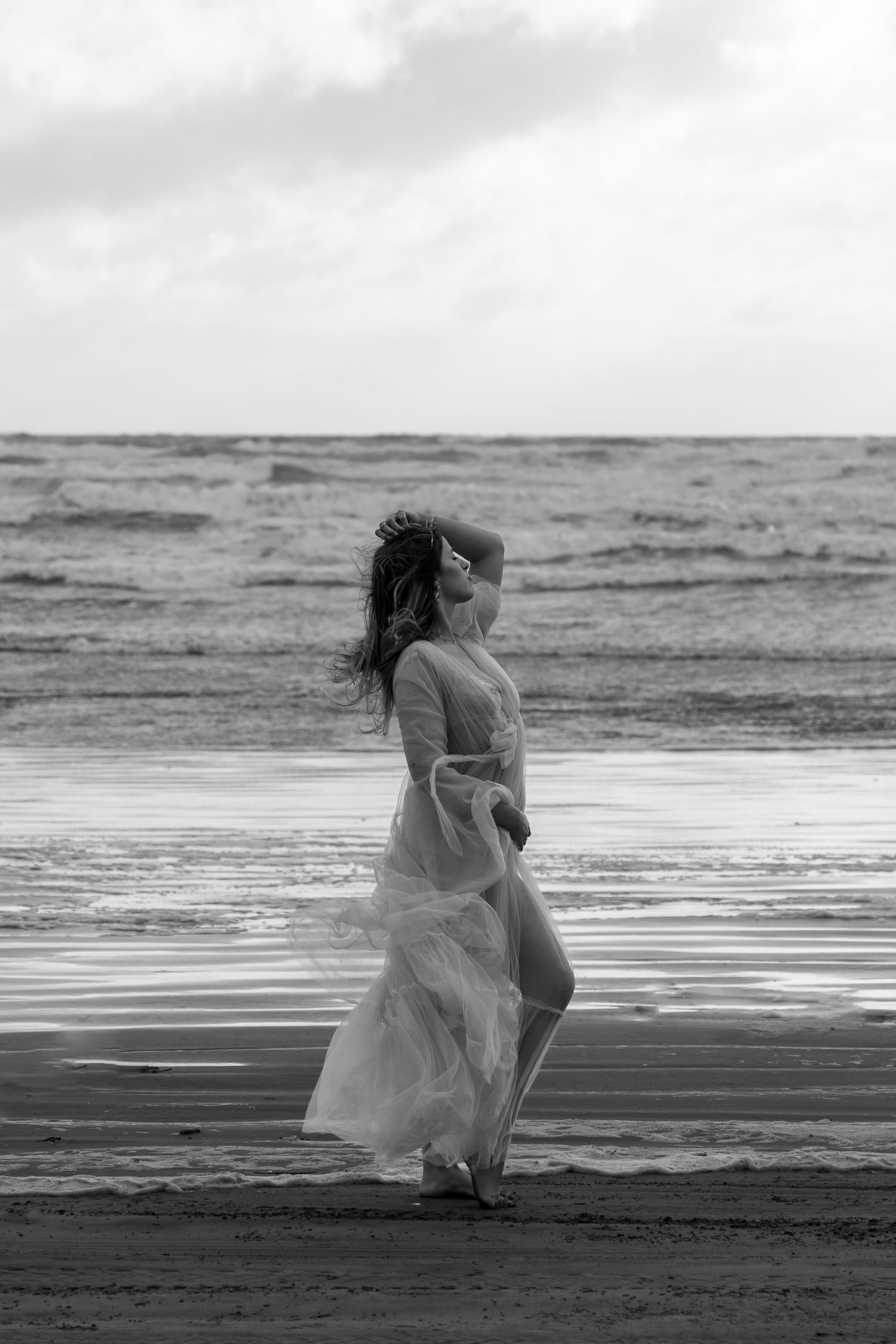 Woman at the beach near water
