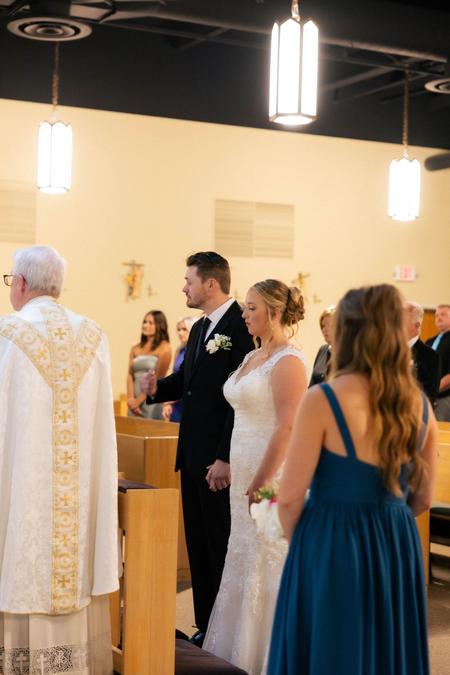 Bride and groom indoor catholic ceremony photos in Frankfort, Illinois