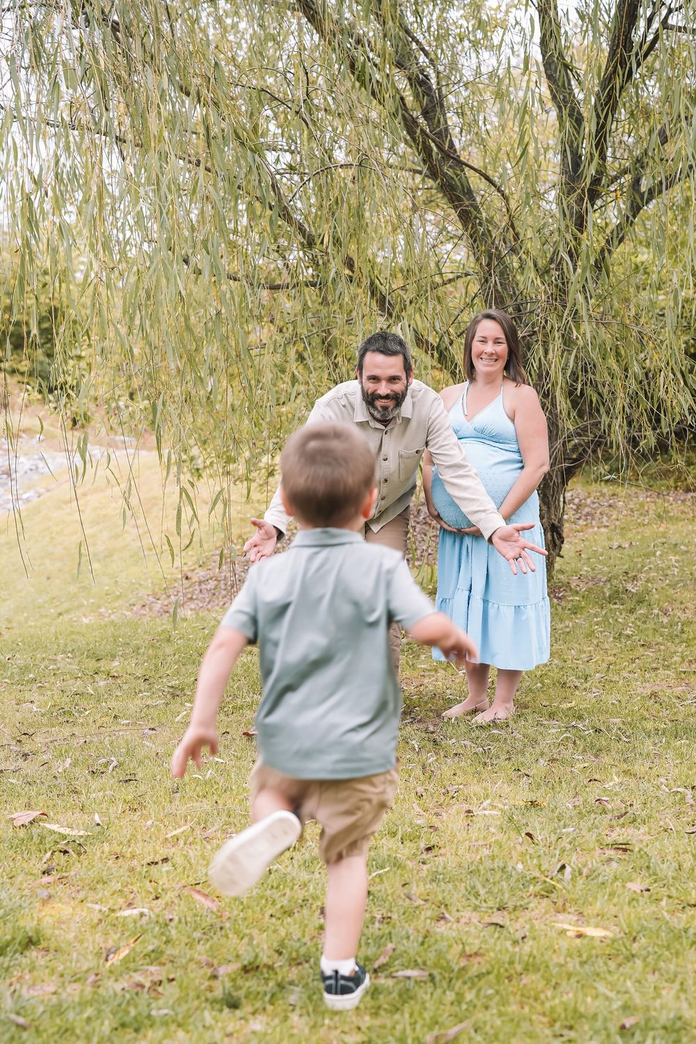 Three sequential photos show a child running and jumping through a grassy area with willow trees in the background. Leesburg, Virginia