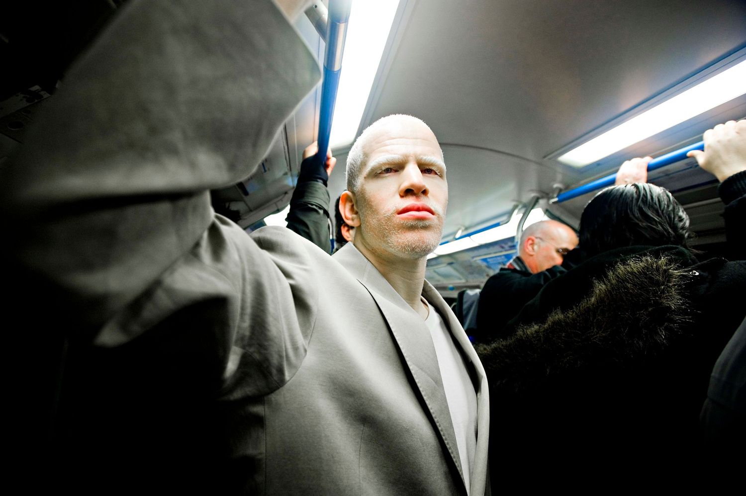 Documentary portrait of Darnell for 'Living with albinism in the UK' photo project. Commuting on the London Underground
