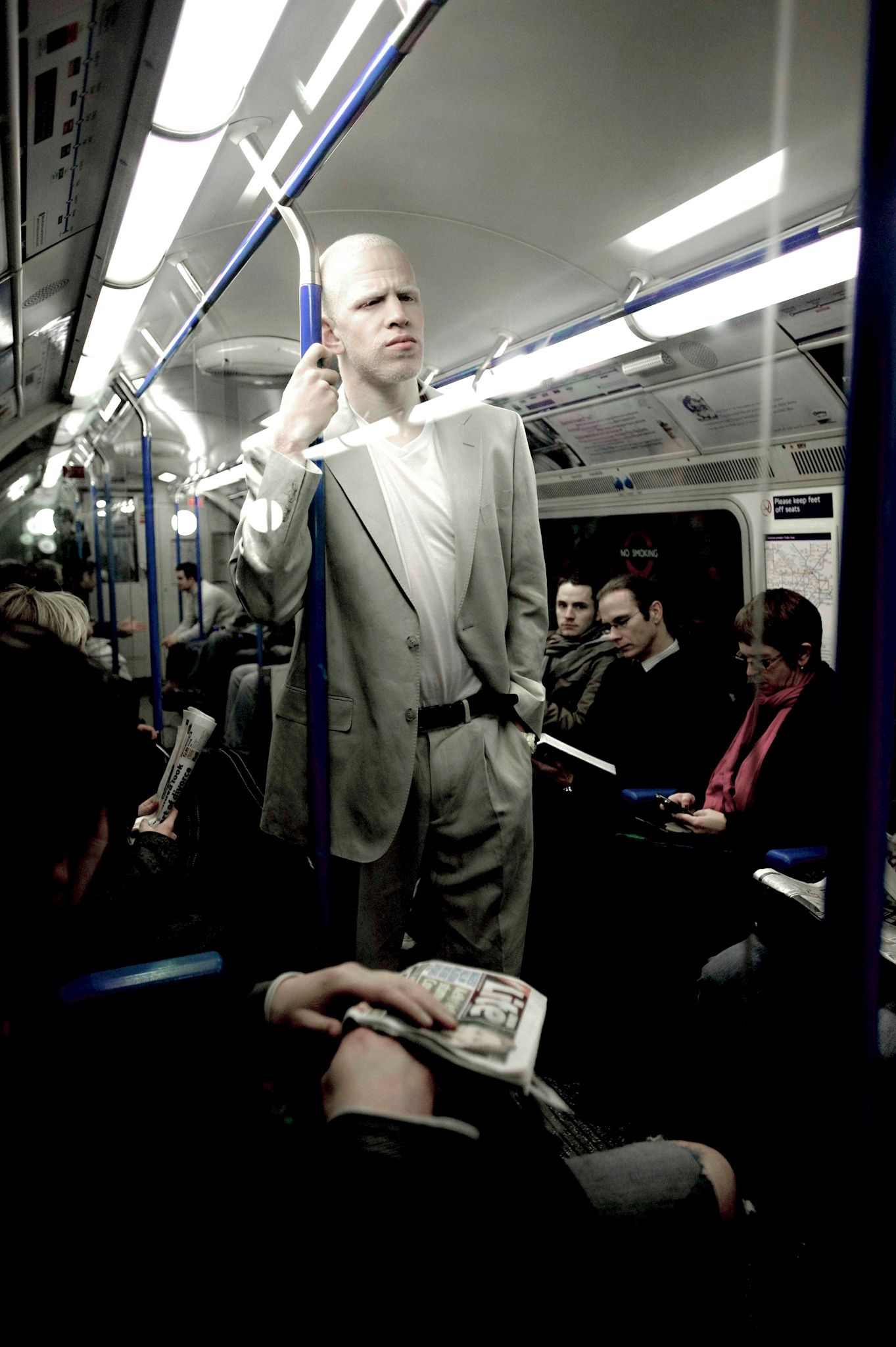 Documentary portrait of Darnell for 'Living with albinism in the UK' photo project. Commuting on the London Subway
