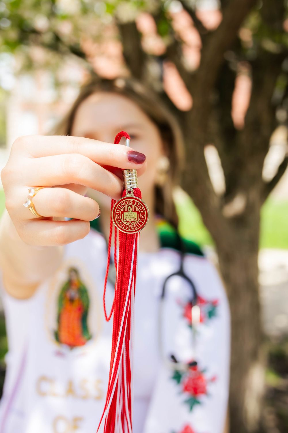 Spring outdoor college graduation photos at Illinois State University in Normal, Illinois