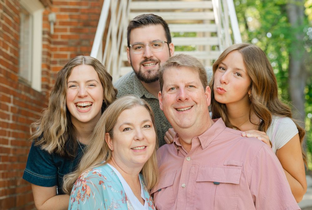 family having fun posing for camera