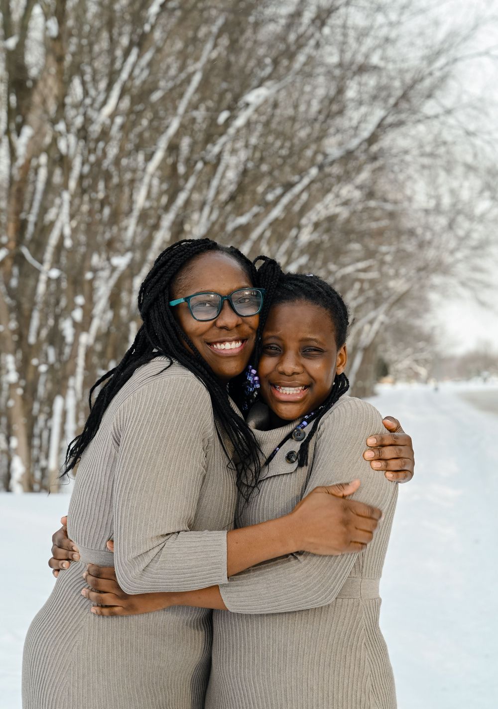 mother and daughter smiling