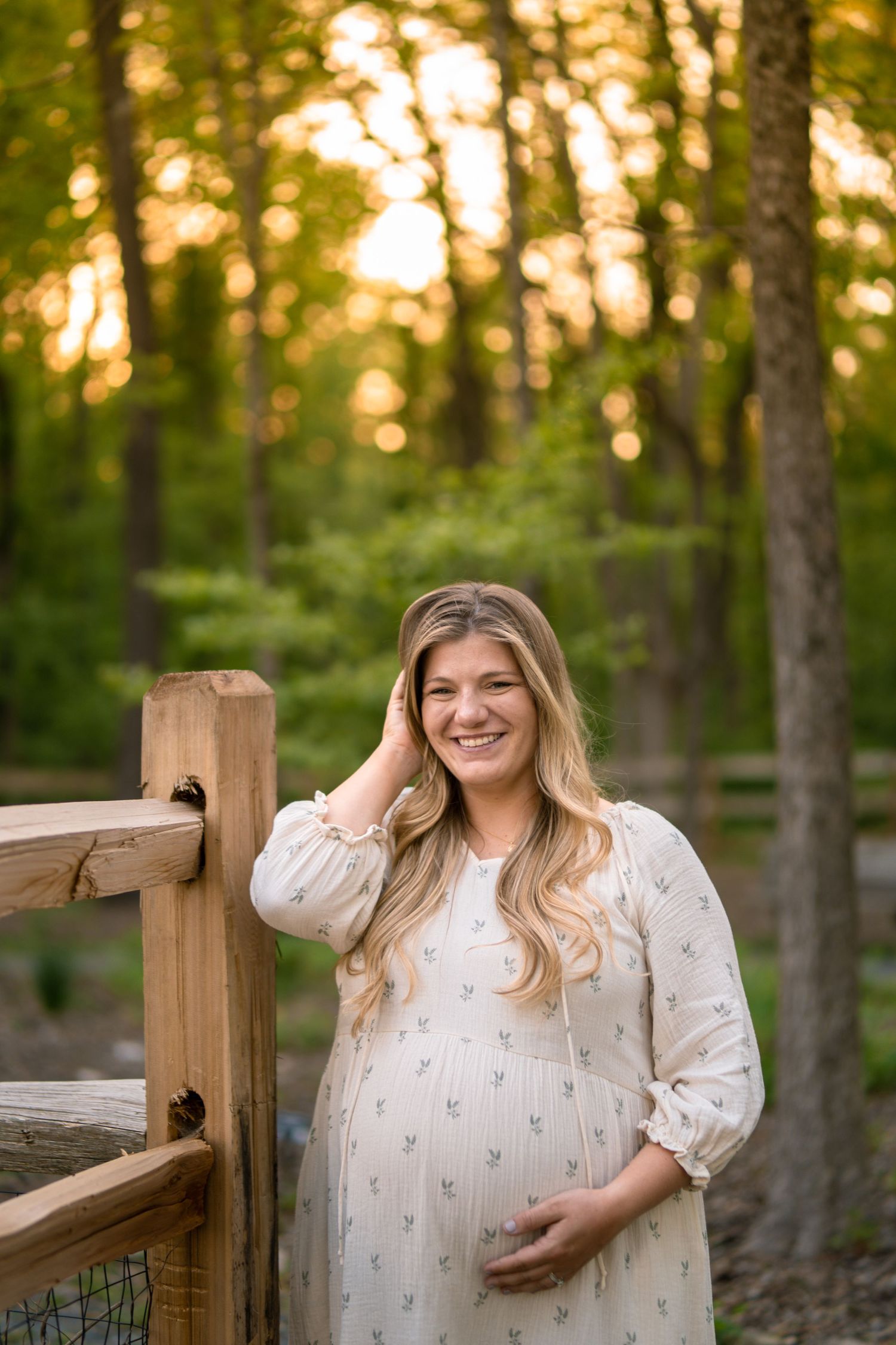 Pregnant wife with husband at a Marietta park maternity session