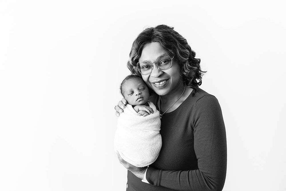 Grandma and newborn photo - black and white photography by Hemet baby photographer.