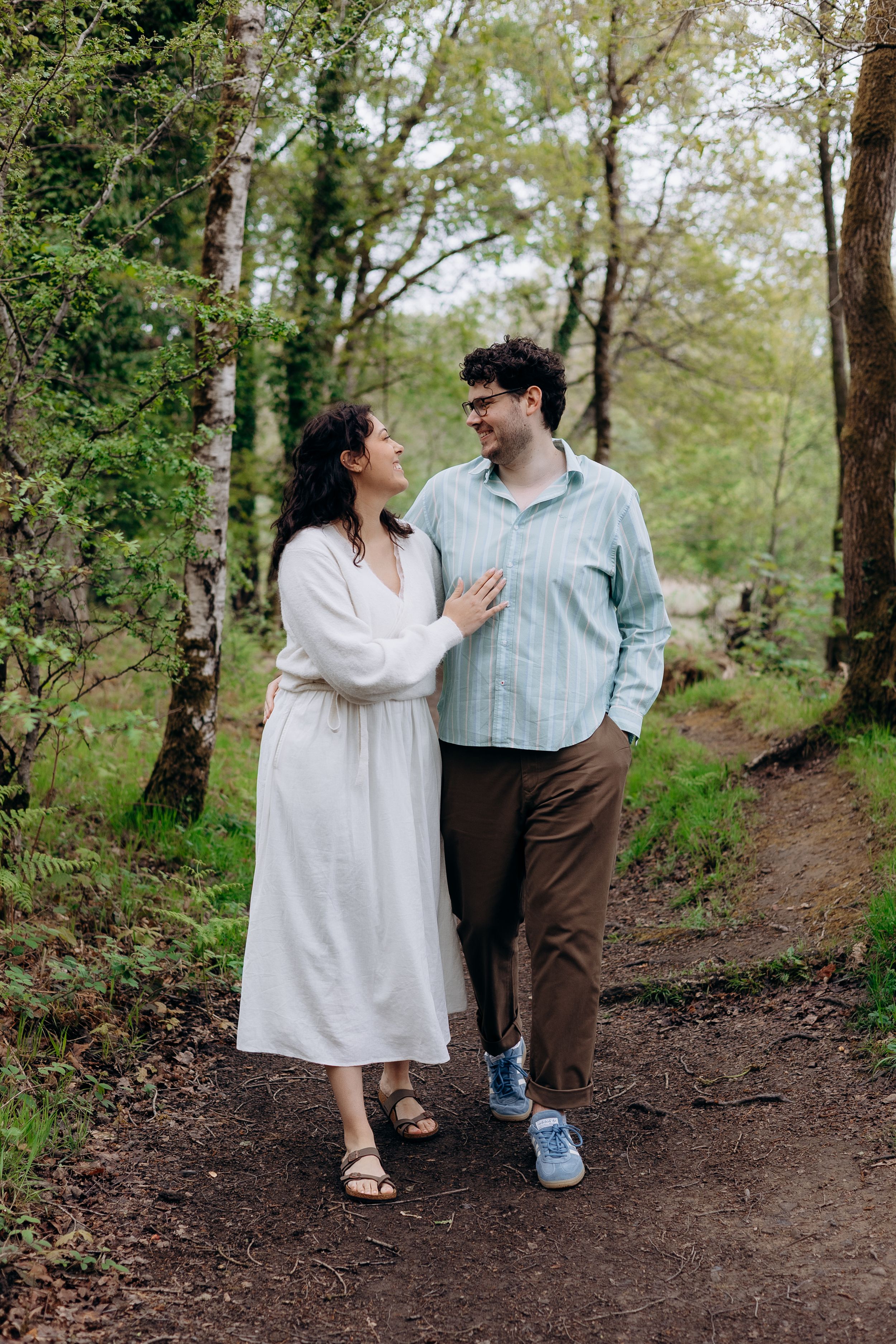 Authentic engagement photography session in Forest of Dean woodland with relaxed documentary style storytelling images.