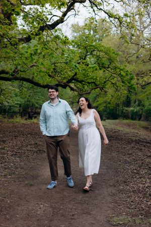 Cinematic woodland engagement photoshoot in the Forest of Dean with natural storytelling couple photography.