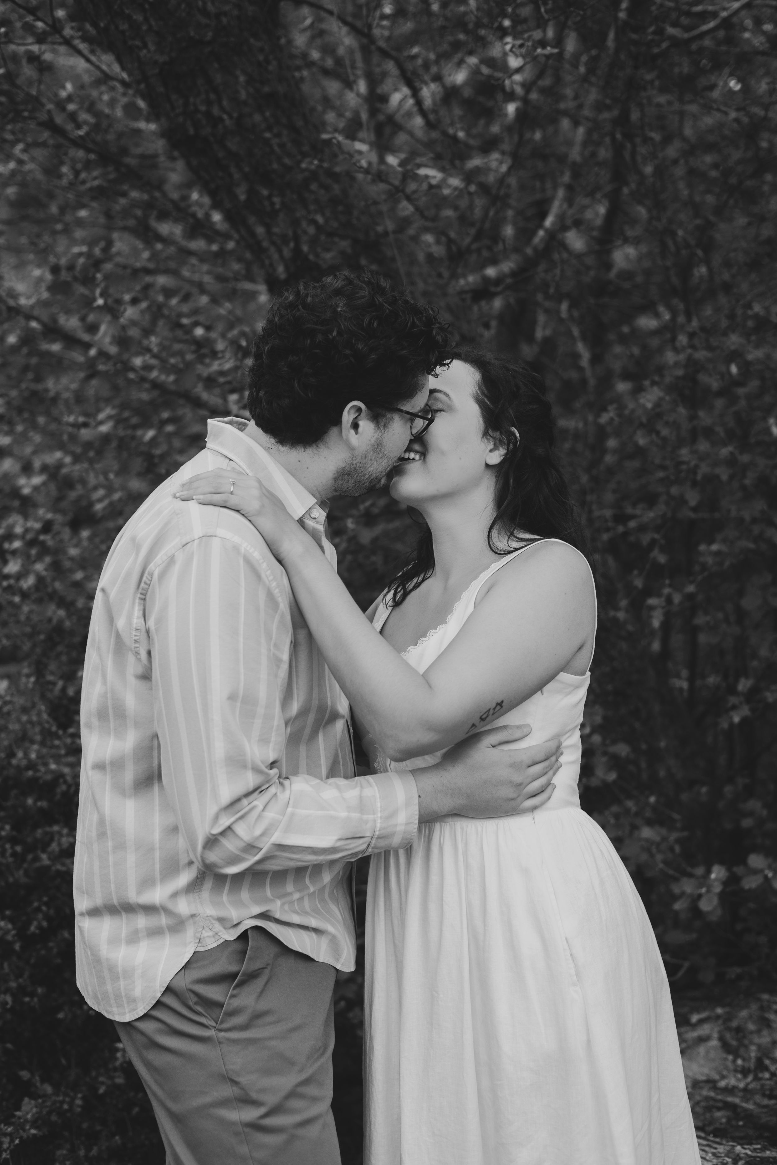 Gloucestershire wedding photographer capturing authentic pre wedding photoshoot in Forest of Dean woodland setting.