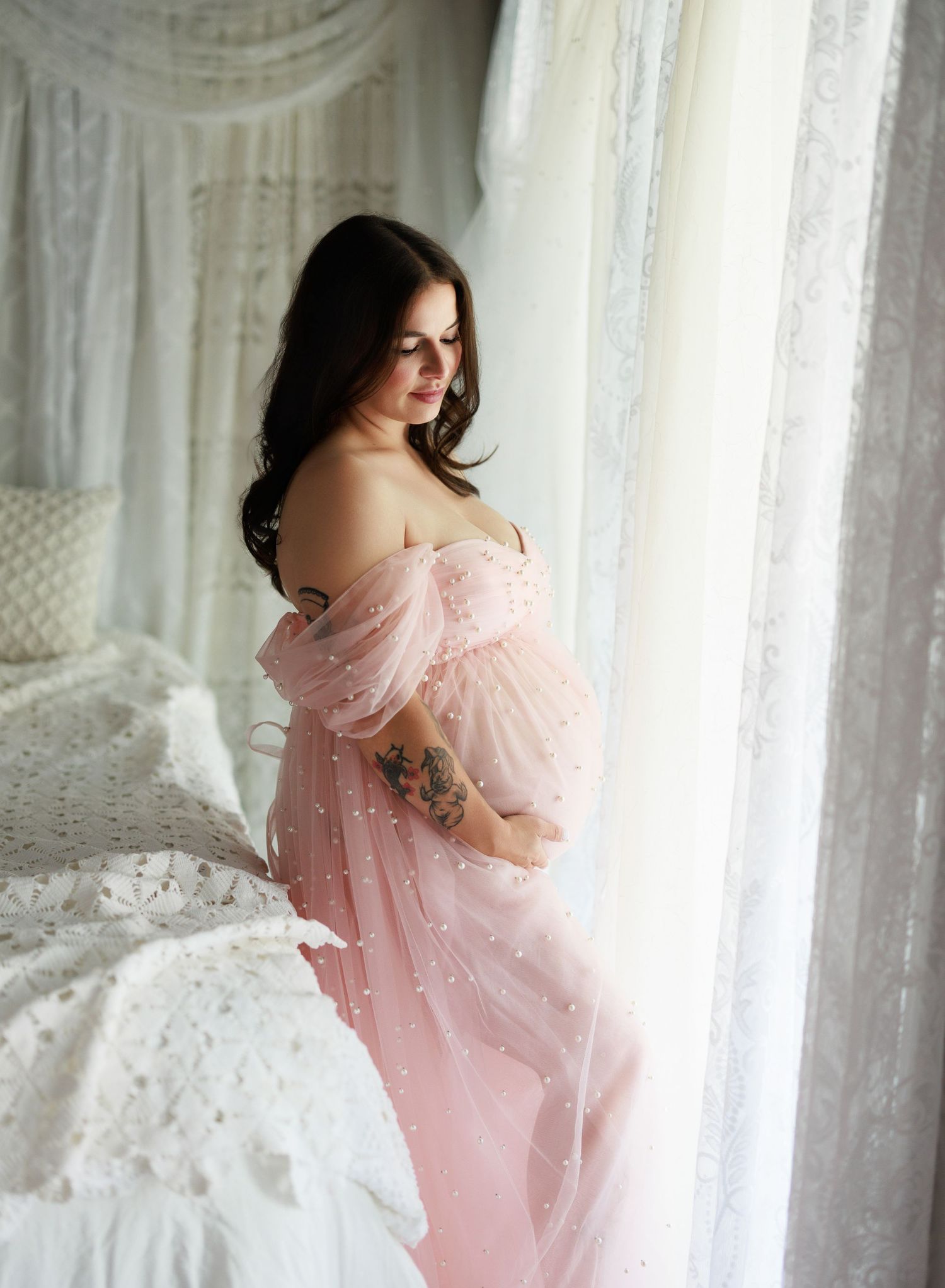 A fine art style maternity indoor photoshoot