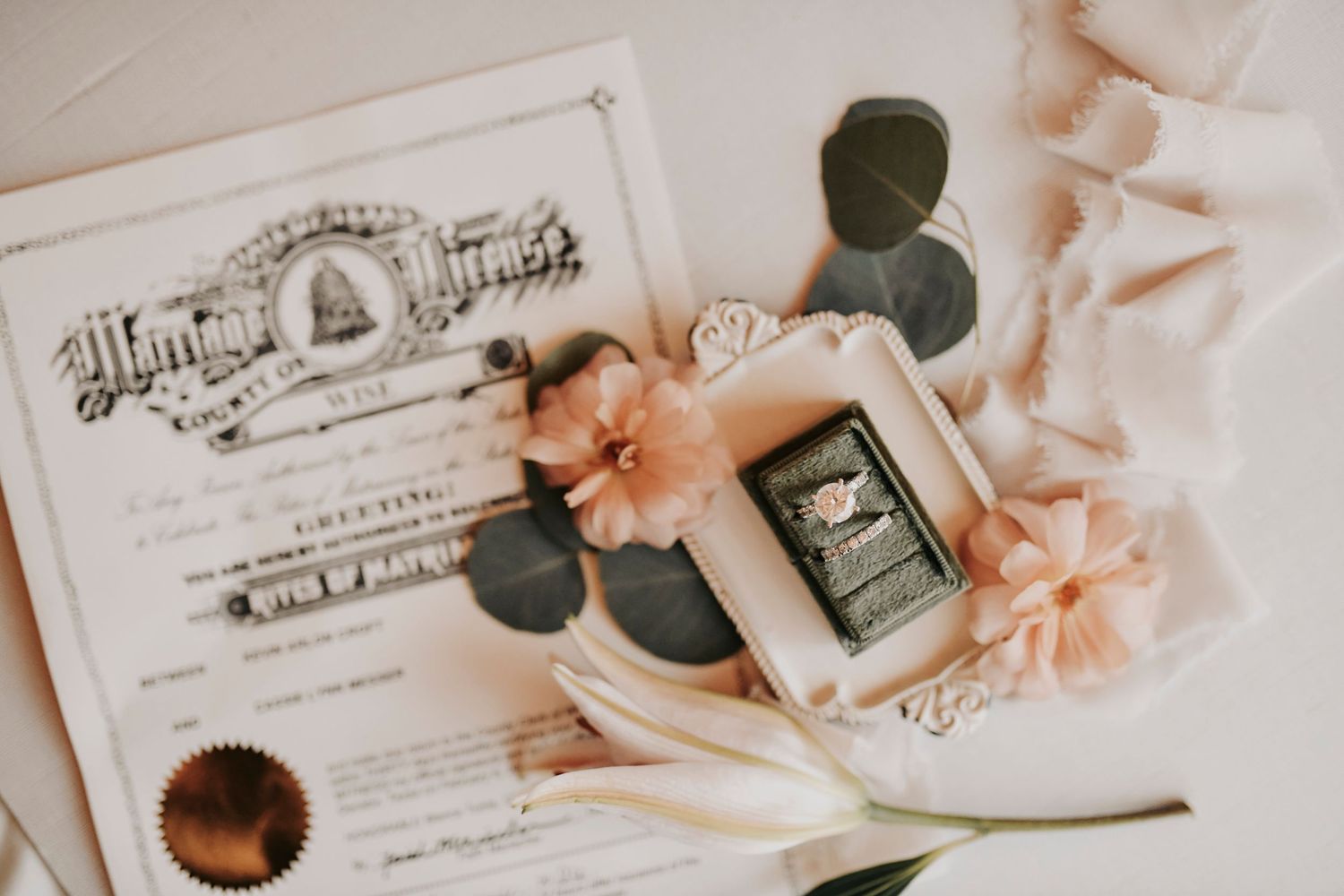 luxury floral flat lay with layered textures and natural garden-inspired styling