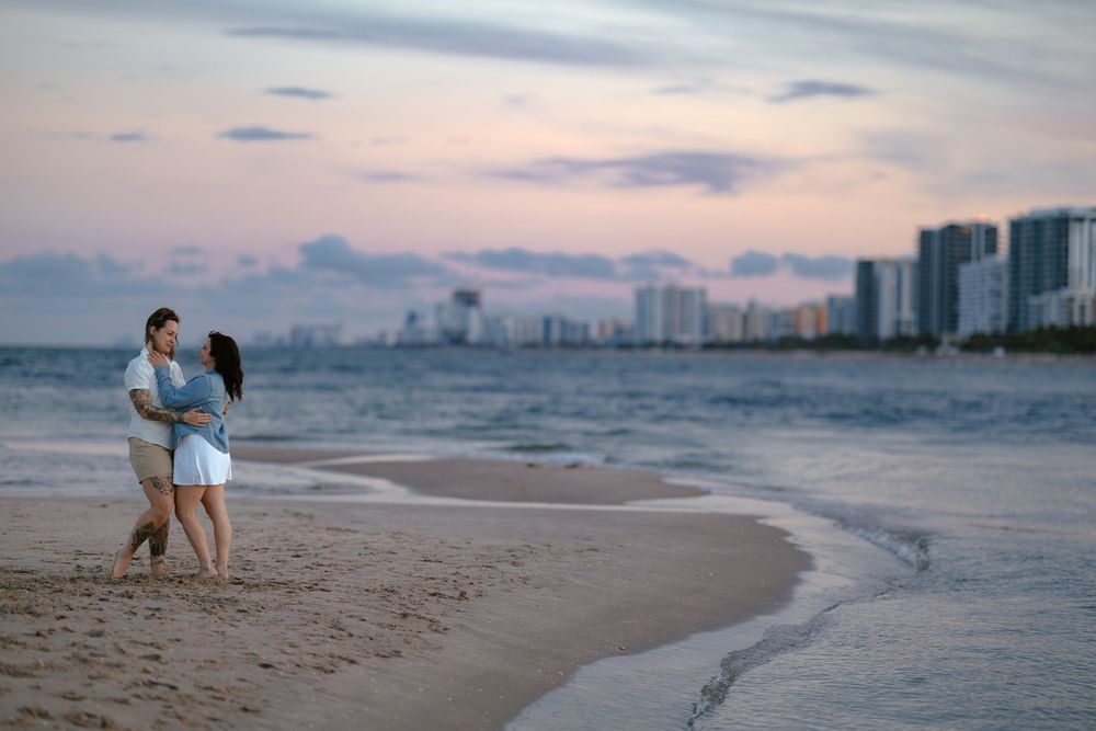 Pompano Beach engagement picture with skyline behind couple