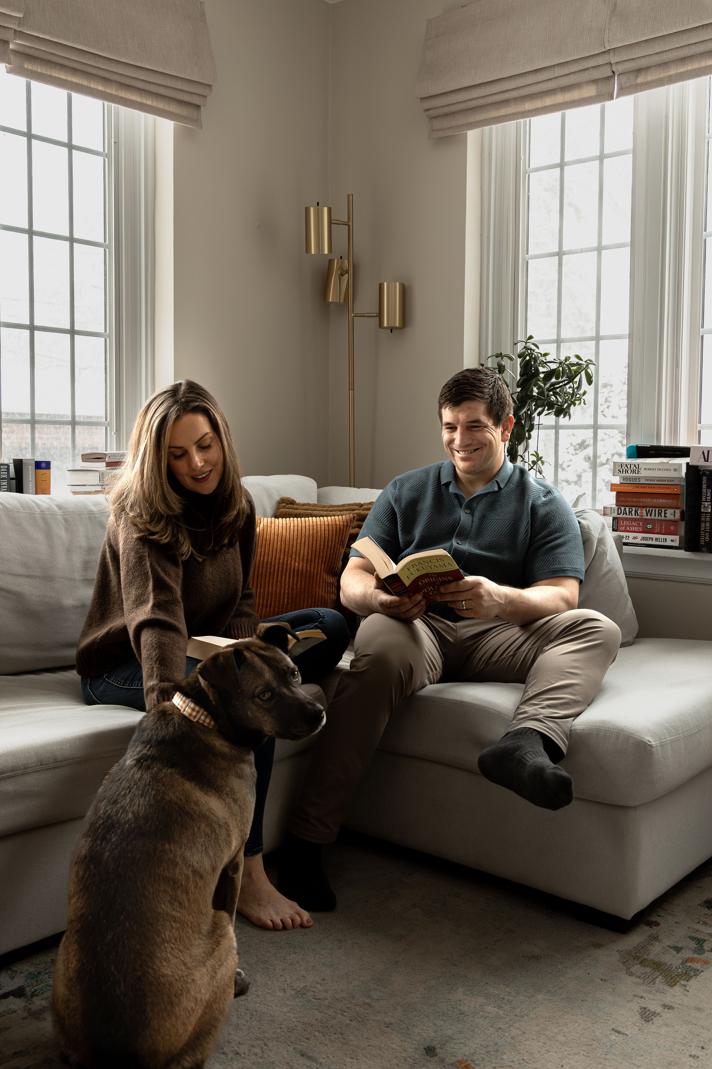 A series of cozy living room scenes showing people relaxing on a white couch with a dog.