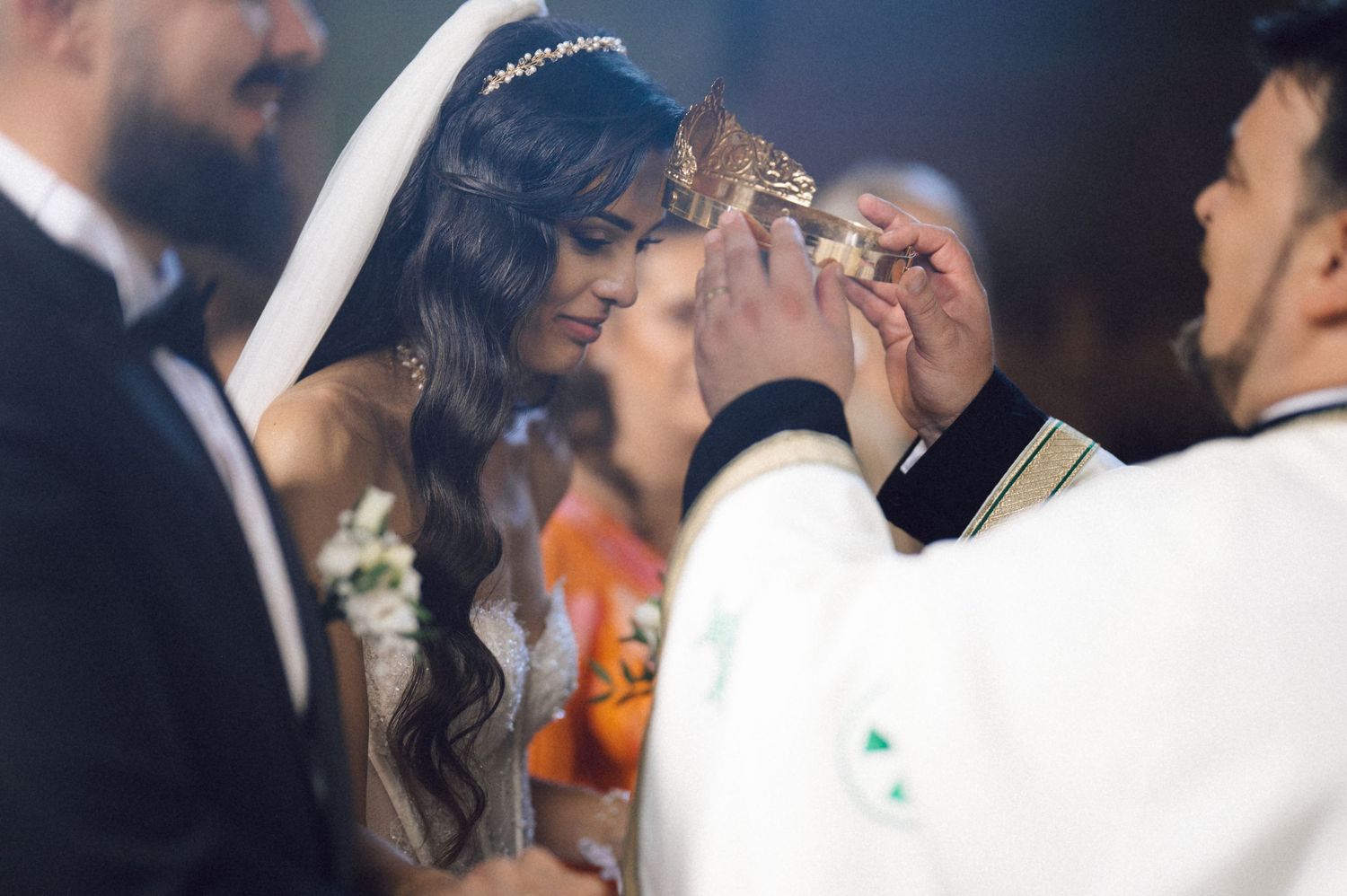 A series of romantic wedding photos showing couples kissing during their special moments at a celebration.