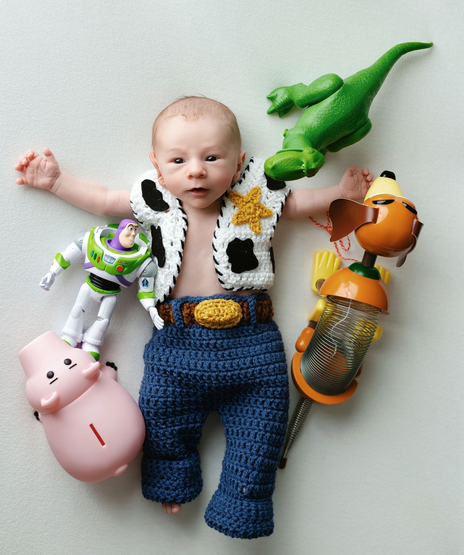 Newborn wearing a Toy Story costume. Greenville, SC newborn photographer, Easley SC newborn photographer, Upstate SC newborn photographer