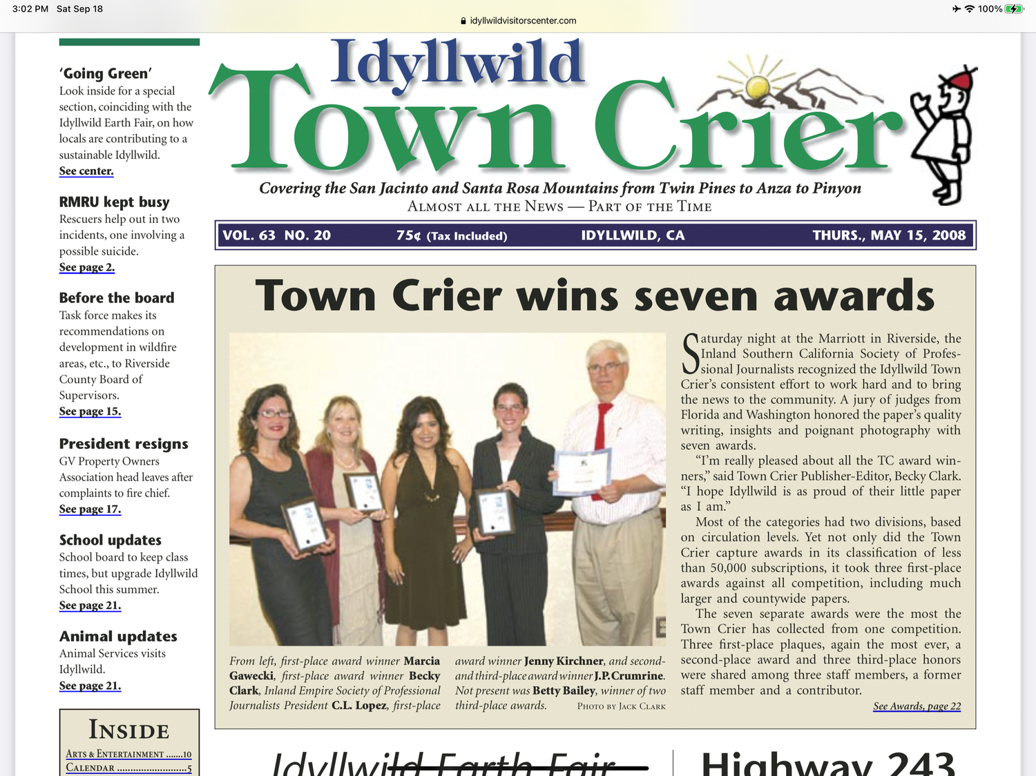 A collection of newspaper front pages showing the Town Crier publication with various headlines and layouts.