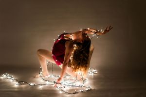 Professional dance portrait in Ridgefield CT studio with controlled lighting and minimalist backdrop focusing on movement and form Ballet