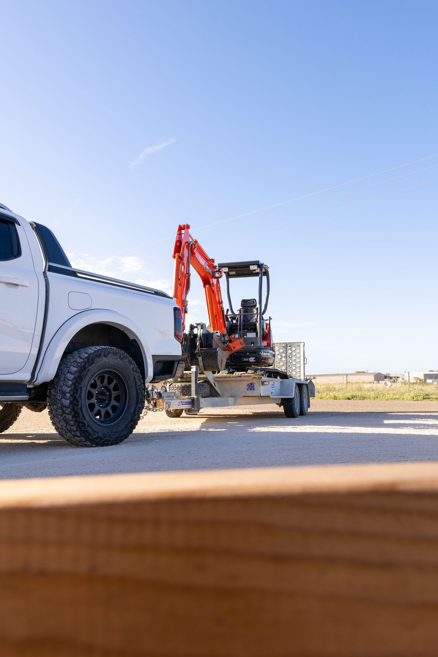 Mini excavator on trailer behind ute – Cartel Equipment Hire Murray Bridge