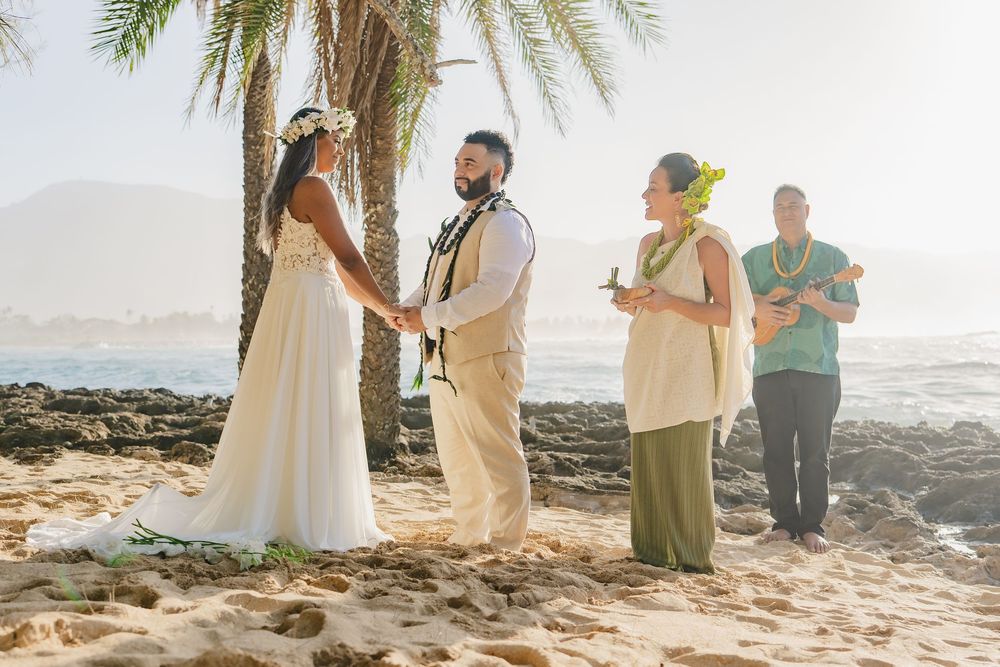 A romantic beach wedding ceremony at North Shore Oahu Hawaii.
Officiant Kelehua.
Video Bishop Media.