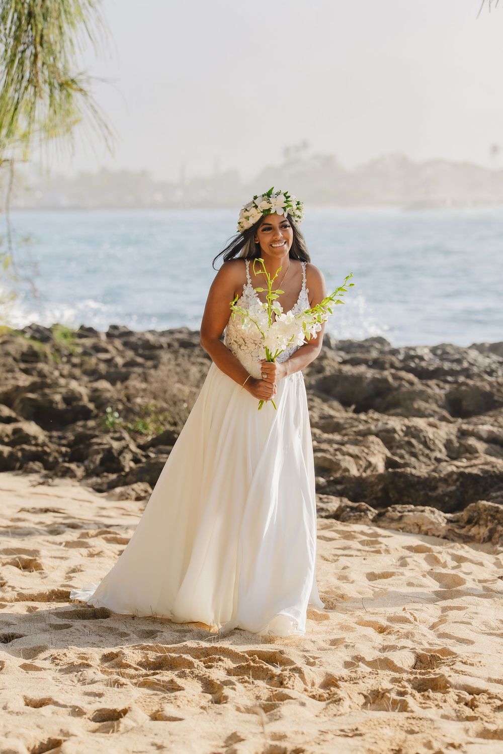 A romantic beach wedding ceremony at North Shore Oahu Hawaii.
Officiant Kelehua.
Video Bishop Media.