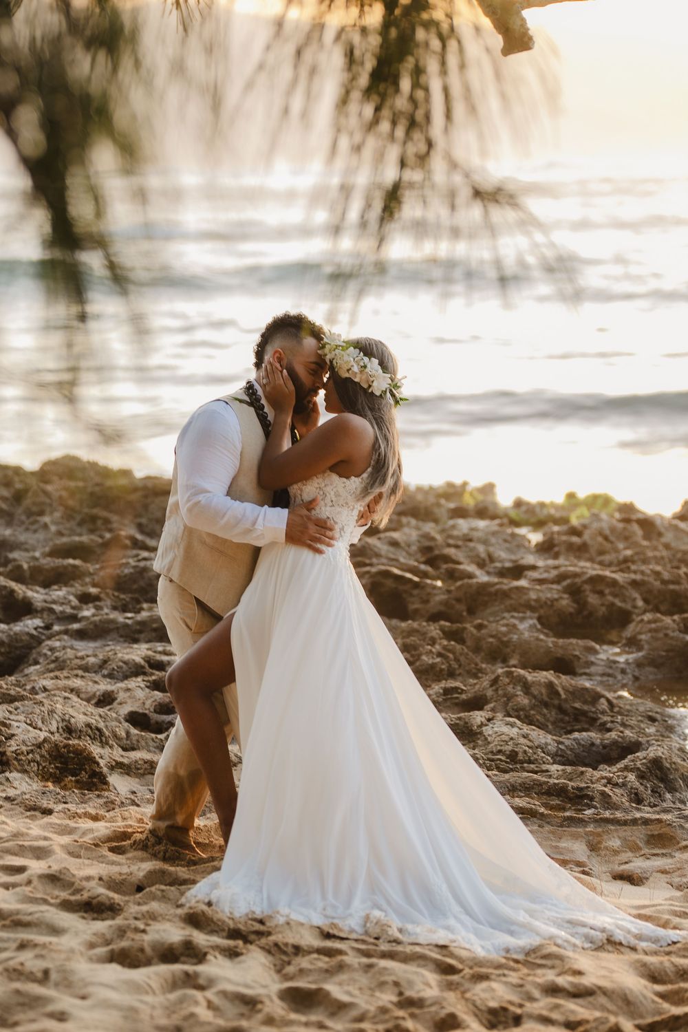 A romantic beach wedding ceremony at North Shore Oahu Hawaii.
Officiant Kelehua.
Video Bishop Media.