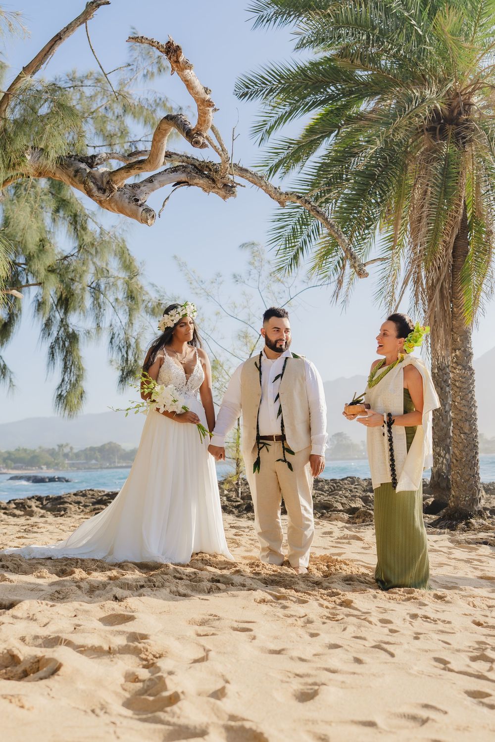 A romantic beach wedding ceremony at North Shore Oahu Hawaii.
Officiant Kelehua.
Video Bishop Media.