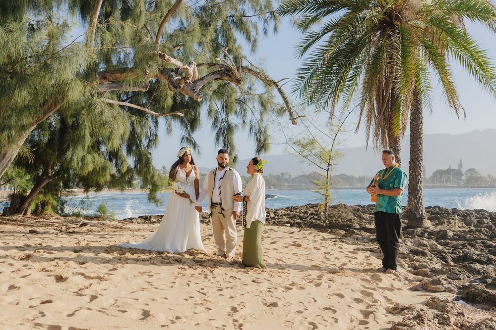 A romantic beach wedding ceremony at North Shore Oahu Hawaii.
Officiant Kelehua.
Video Bishop Media.