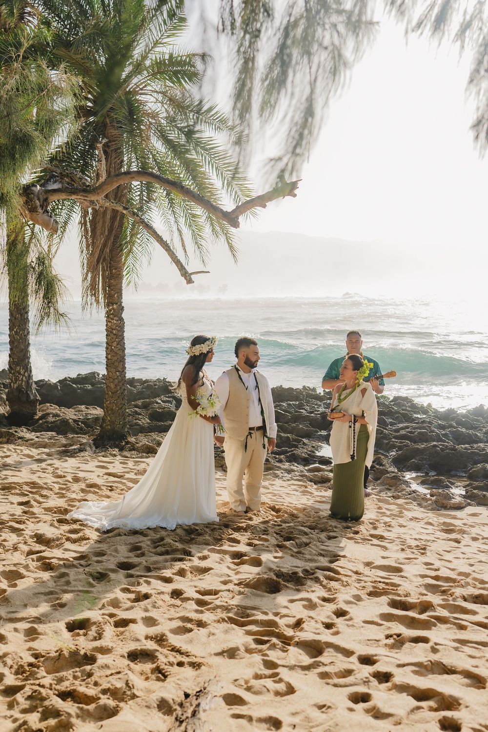 A romantic beach wedding ceremony at North Shore Oahu Hawaii.
Officiant Kelehua.
Video Bishop Media.