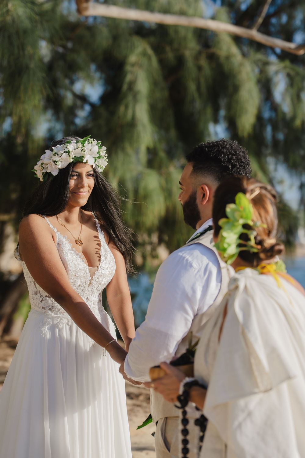 A romantic beach wedding ceremony at North Shore Oahu Hawaii.
Officiant Kelehua.
Video Bishop Media.