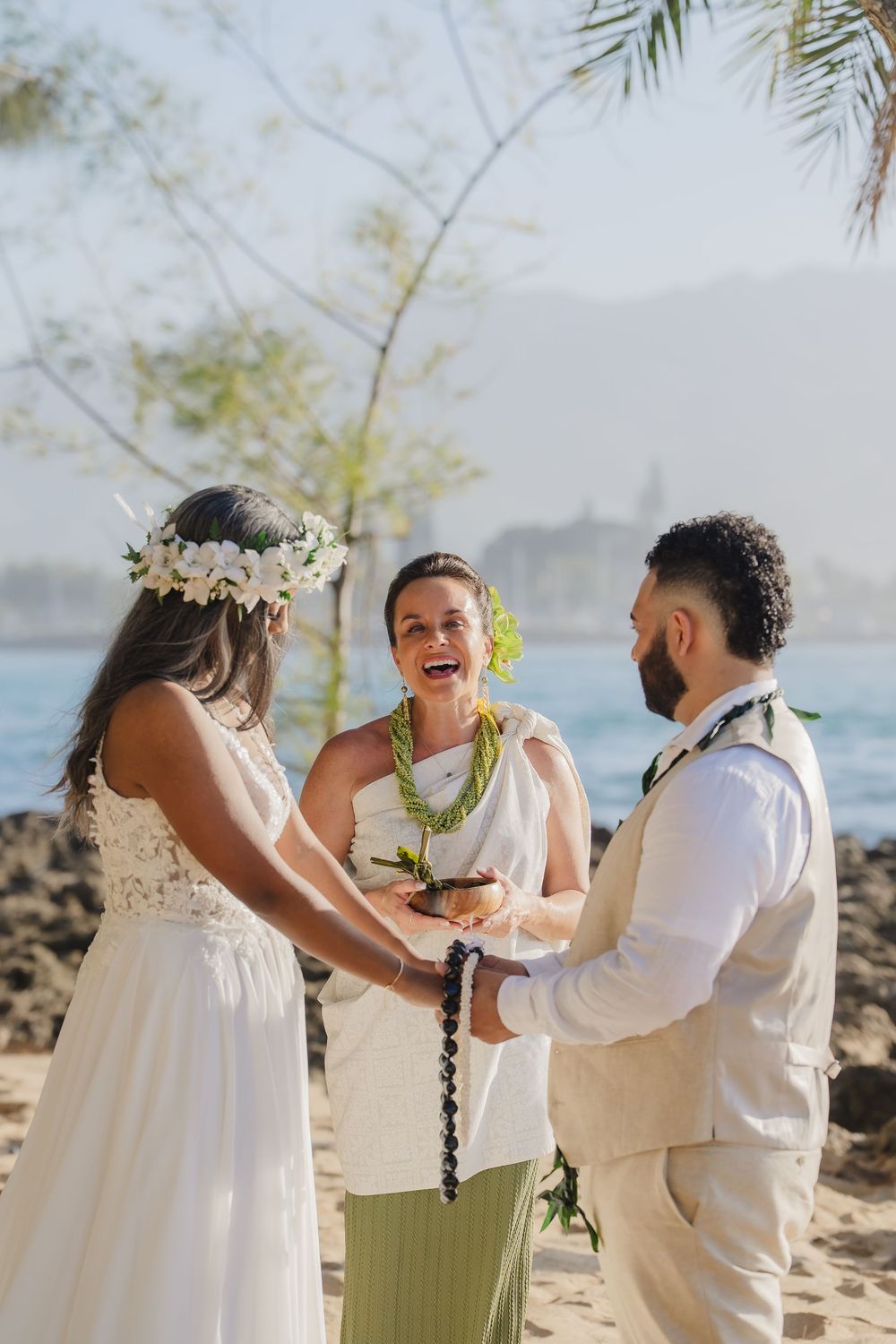 A romantic beach wedding ceremony at North Shore Oahu Hawaii.
Officiant Kelehua.
Video Bishop Media.