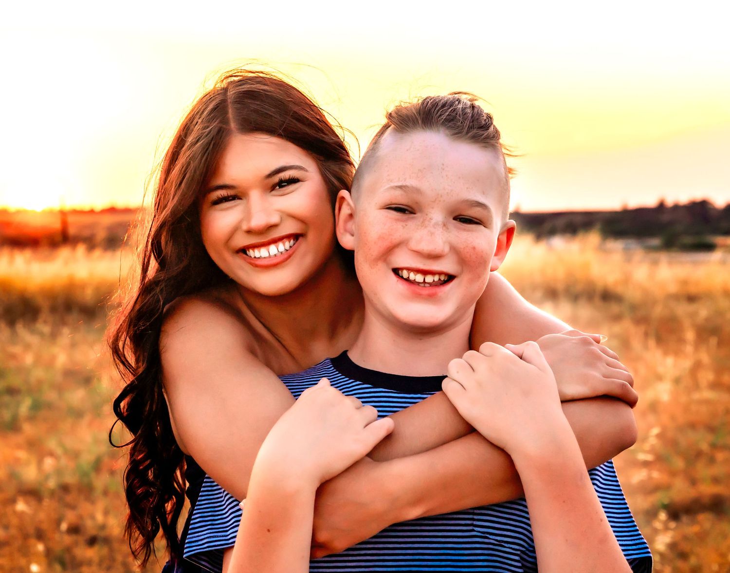 Siblings captured in gorgeous golden hour in fresno,ca