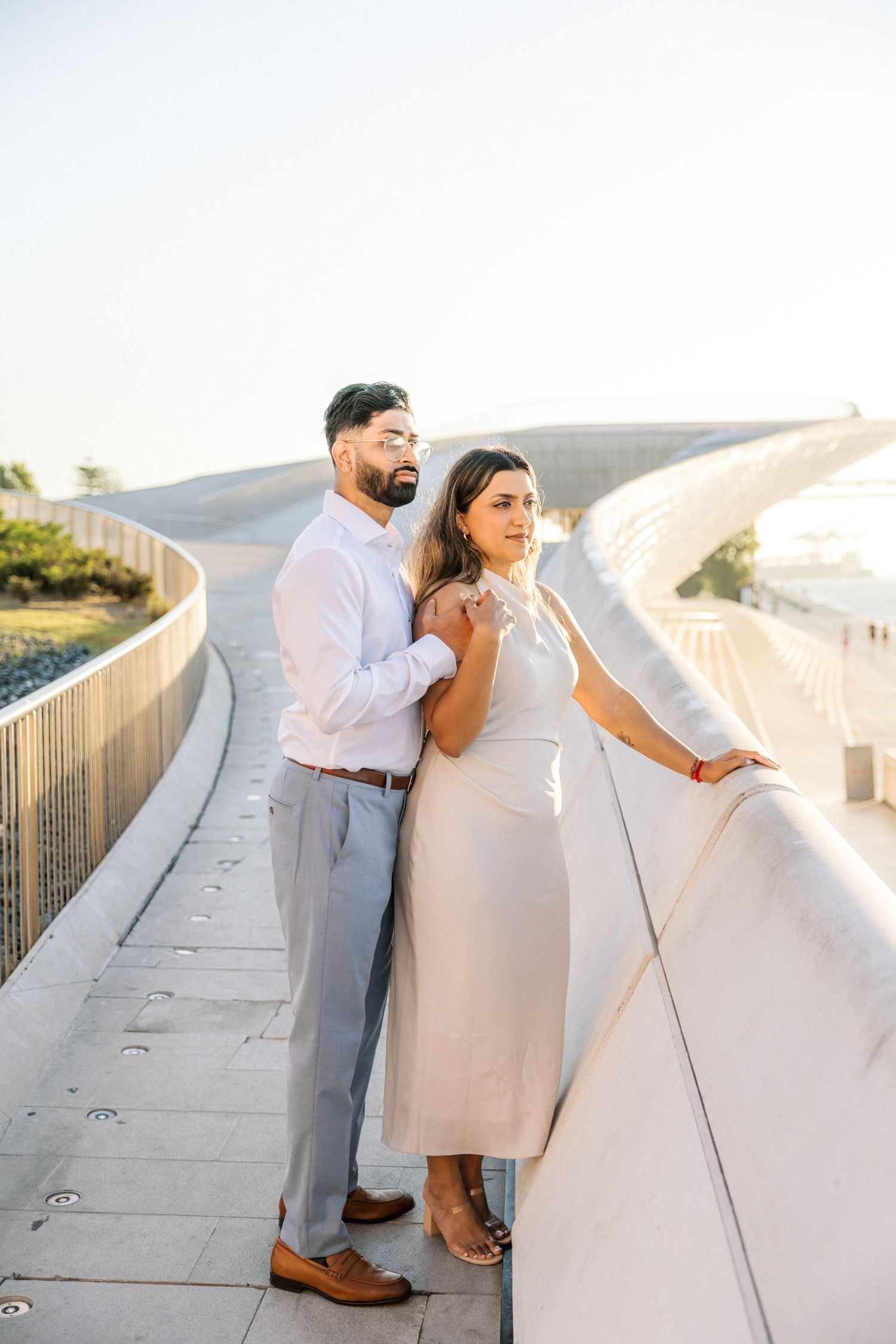 Bride and groom at MAAT Lisbon sunrise — modern architecture and cinematic engagement photography in Portugal.