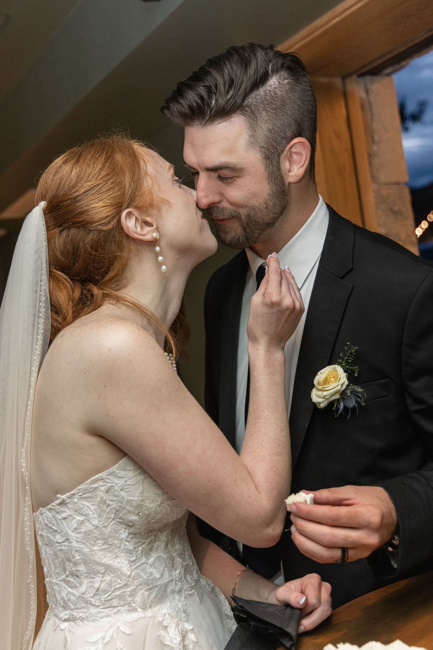 Romantic wedding couple shares intimate moments during their reception celebration.
